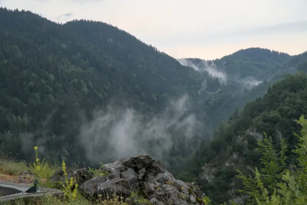 Morning mist in the mountains rises over Zaovine Lake in Tara National Park, Serbia.