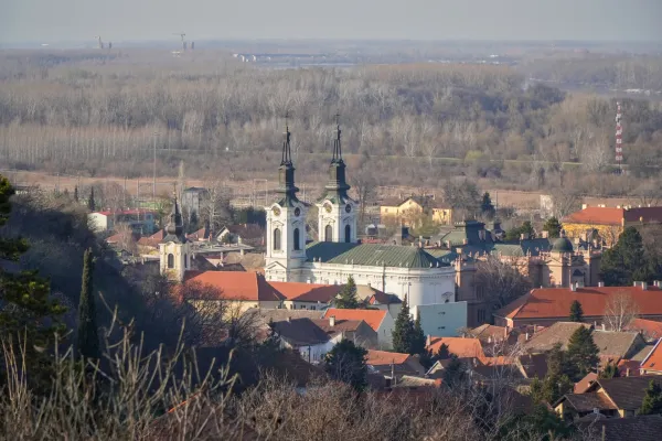 Aerial view of St. Nicholas Church in Novi Sad, Serbia, showcasing its detailed architecture and surrounding cityscape.