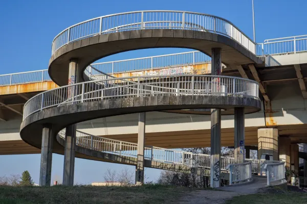 Spiral staircase descent from Freedom Bridge into Kamenički Park, Novi Sad, Serbia.