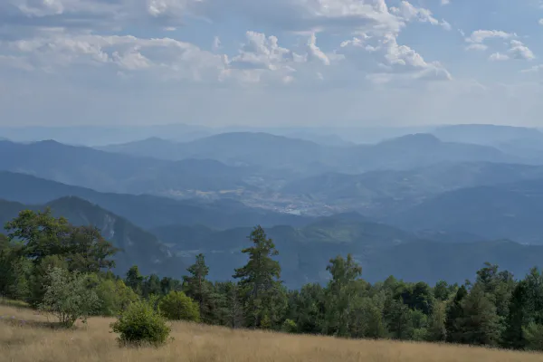Mountain landscape of Višegrad, Serbia, showing the town in the valley and the view from Janyač Mountain.