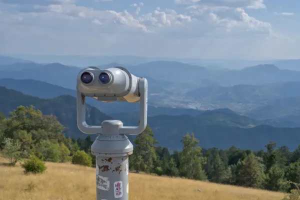 Binoculars on Janyač peak looking towards Višegrad in Tara National Park, Serbia.