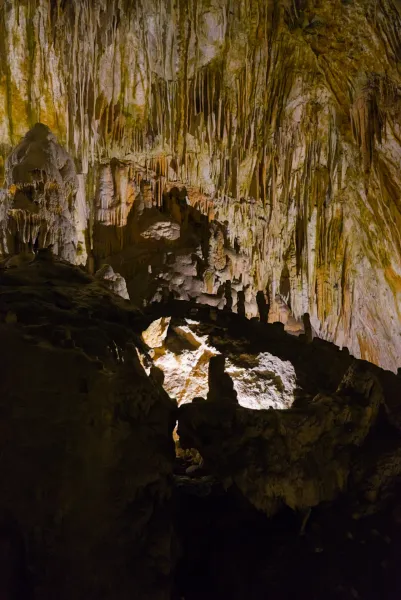 Intricate stalactites and formations within Postojna Cave (Postojnska jama), illuminated for artistic prints.