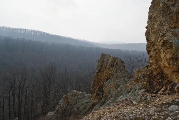 Orlovy Walls and mist-covered hills in Fruska, February. A landscape fine art print for gallery and interior decoration.