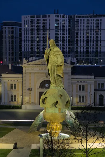 Monument of Stefan Nemanja against the backdrop of the old railway station in Belgrade, Serbia, close-up.
