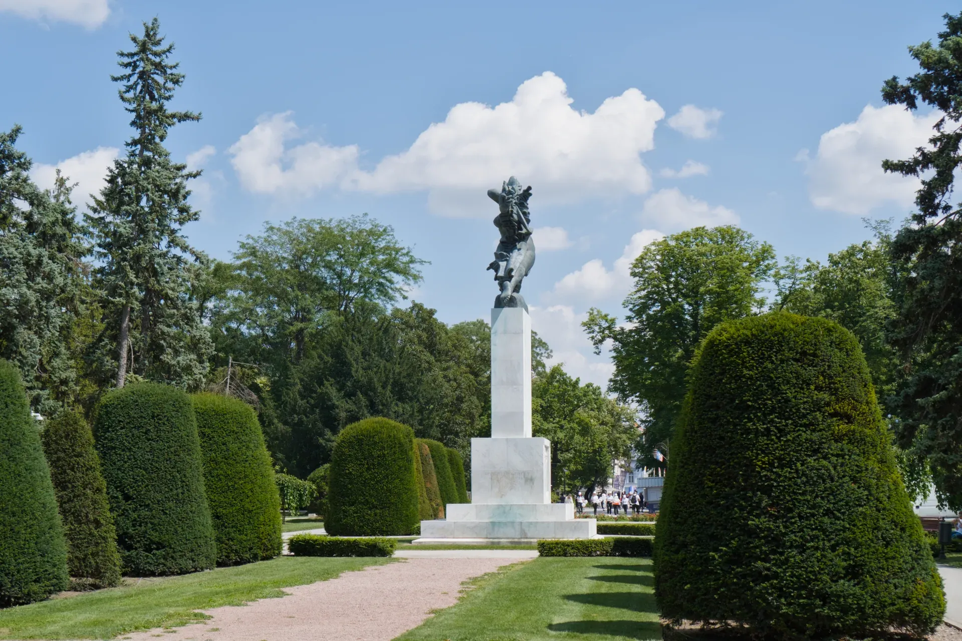 Monument "Gratitude to France" in Belgrade, Serbia, against a blue sky with clouds.