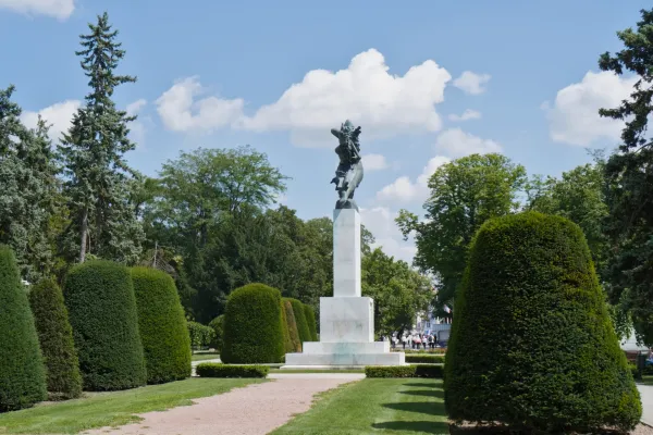 Monument "Gratitude to France" in Belgrade, Serbia, against a blue sky with clouds.