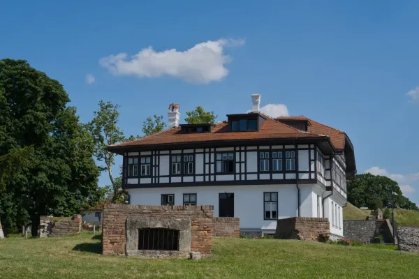 Historic house Kalemegdan in Belgrade, Serbia, with traditional architecture and tiled roof under a clear blue sky.