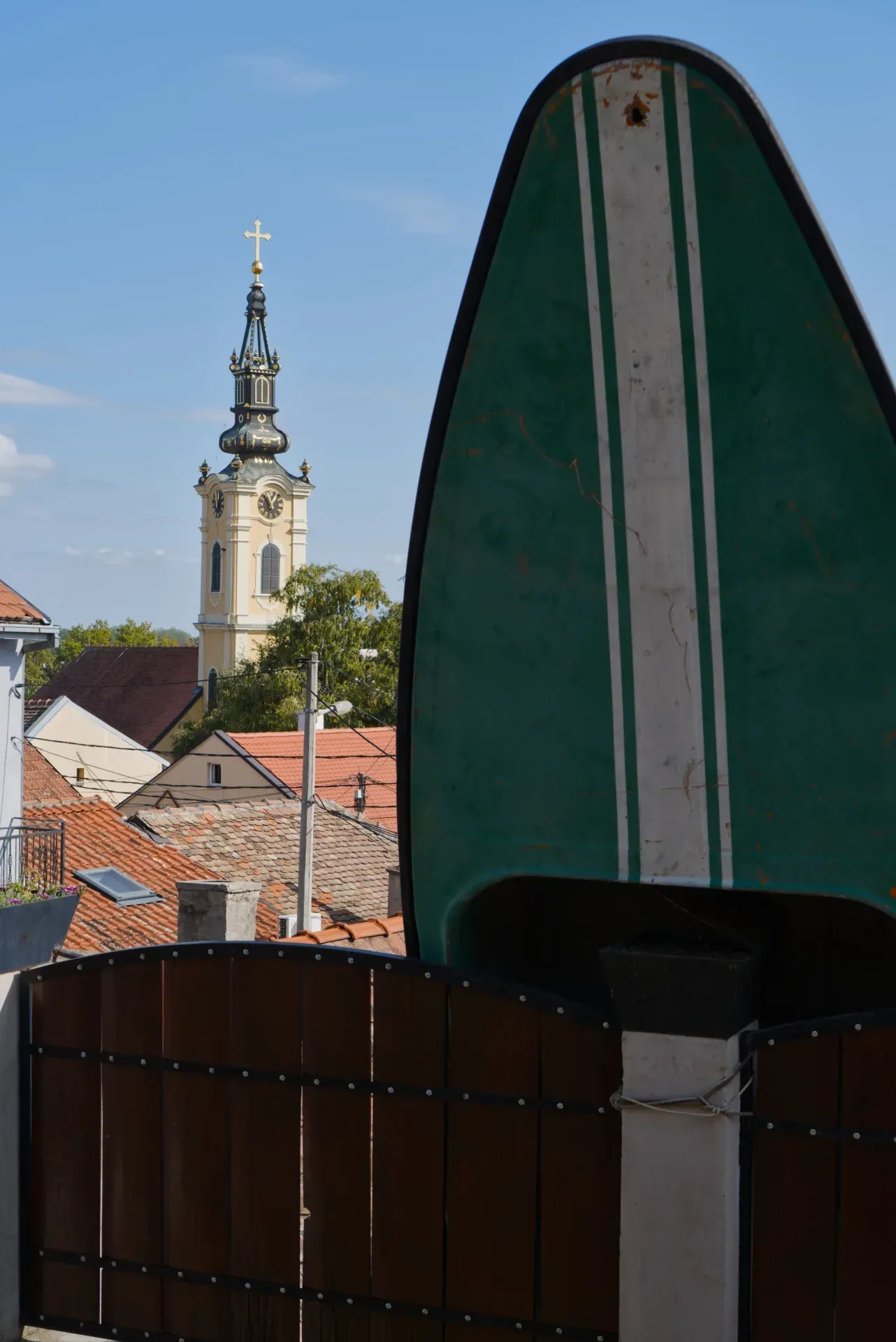 Zemun, Belgrade: Portrait photograph of a historic church tower against a blue sky.