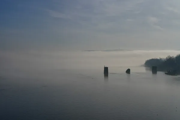 Danube in fog, view from Varadin Bridge, Novi Sad, Serbia.
