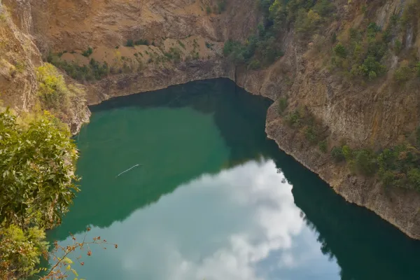 Dense clouds reflected on the mirror-like surface of Ledinačko Lake, Novi Sad.